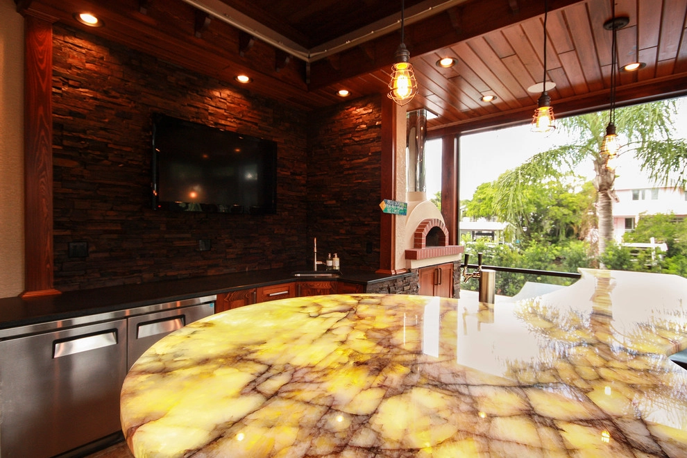 Siesta Key outdoor kitchen, bar, pizza oven by Design Scapes - Photo 5