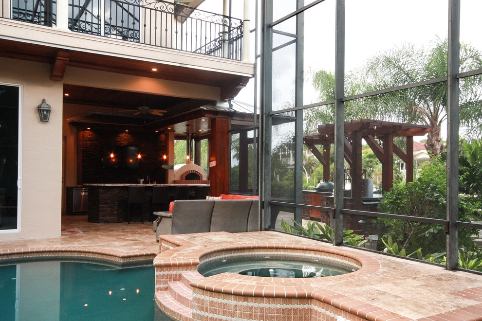 Siesta Key outdoor kitchen, bar, pizza oven by Design Scapes - Photo 8