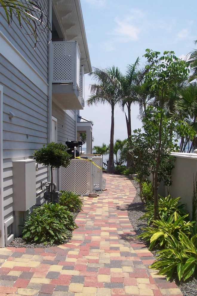 Lido Key Coastal style landscape with lagoon pool by Design Scapes - Photo 24