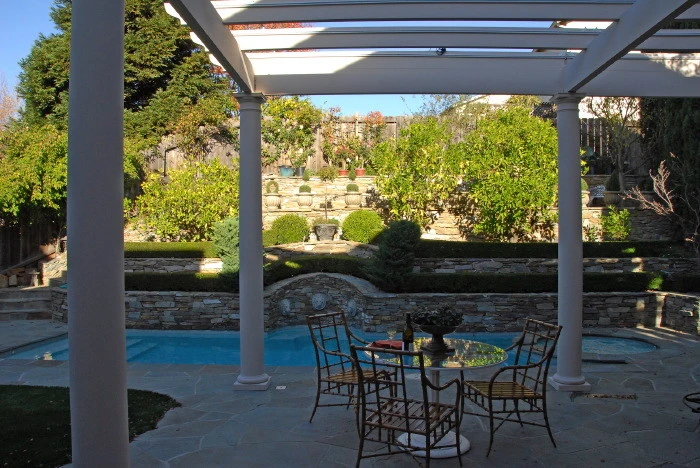 Formal Pool Garden by Lazar Landscape Design And Construction - Photo 8