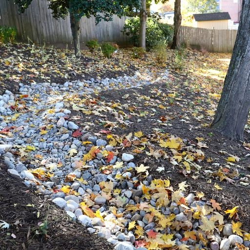Backyard creek bed by Earth Essence Designs - Photo 12