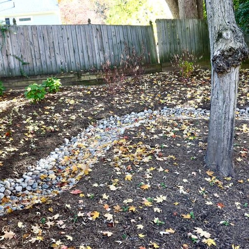 Backyard creek bed by Earth Essence Designs - Photo 9