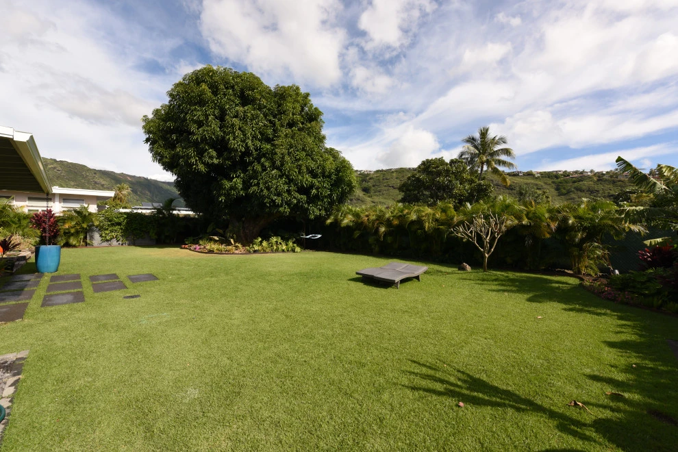 Outdoor Space with Square Pavers by Lanaiscapes - Photo 11