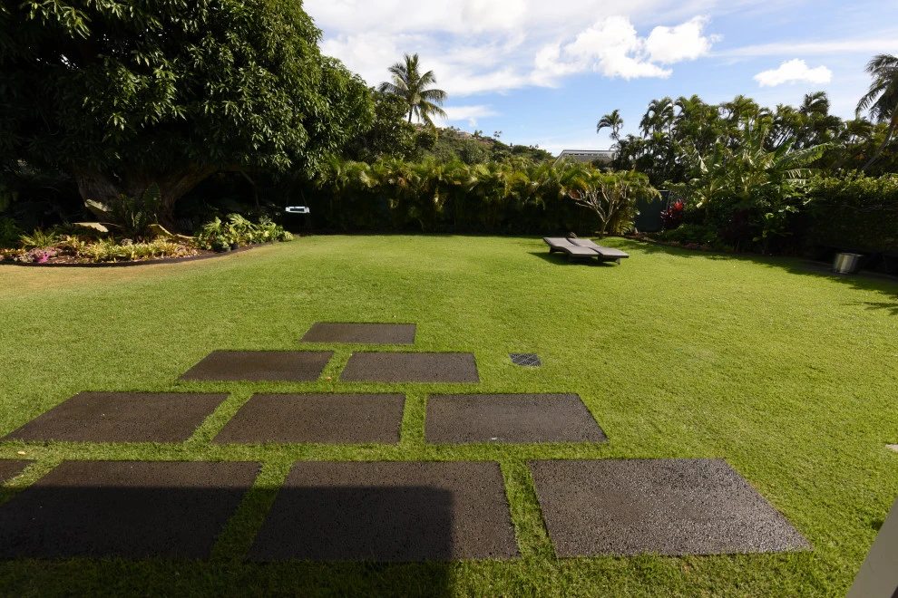 Outdoor Space with Square Pavers by Lanaiscapes - Photo 12