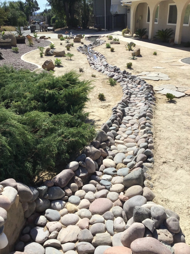 Water in river rock / Decomposed granite design by Exterior Designs Landscape - Photo 3