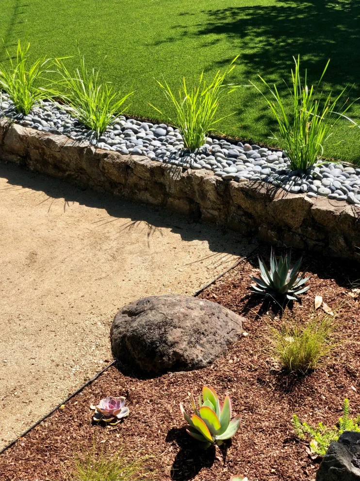 Family Friendly Outdoor Living by Wildflower Landscape Design At K&D Landscaping - Photo 6