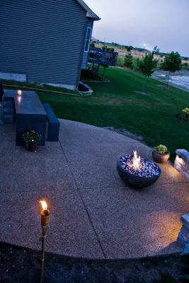 Outdoor Area with Kitchen and Fire Bowl — Landscape Construction project by Concrete Evolutions