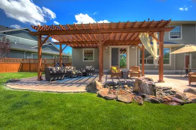 Backyard Patio Retreat with Pergola Cover — Landscape Construction project by Cripple Creek Landscapes in Boise