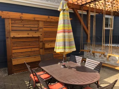 Swinging Backyard Bar — Landscape Design project by A&M Landscaping LLC in Denver