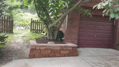 8" Diamond Pro Block Wall — Landscape Design project by Above And Beyond Complete Grounds Maintenance in Omaha