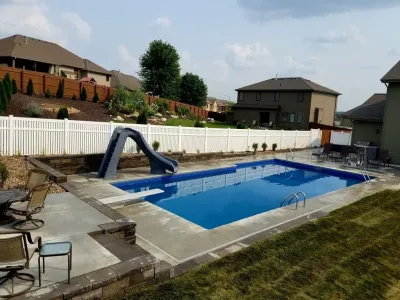 Swimming Pool with 8" Clifton Wall — Landscape Design project by Above And Beyond Complete Grounds Maintenance