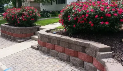 Colorful Retaining Wall — Landscape Design project by Above And Beyond Complete Grounds Maintenance