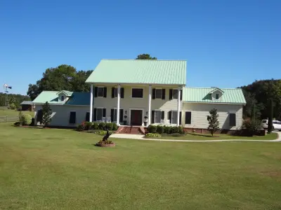 Patina Copper Roof Color — Home Renovation & Remodeling Services project by Streamline Roofing & Construction, Inc.