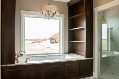 Albright Classic Residence - Bedroom & Bathroom by Robbins Construction
