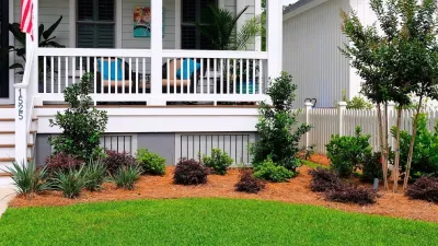 Blue stone patio and pond view — Landscape Design project by Green Grass Landscape Contractors