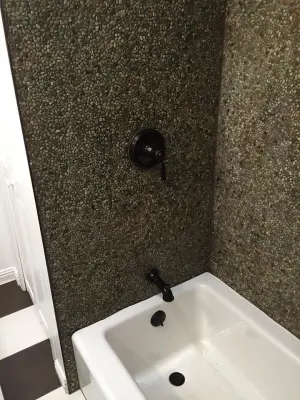 Vintage-Inspired Compact Bathroom Remodel by Technically Aesthetic General Contractors