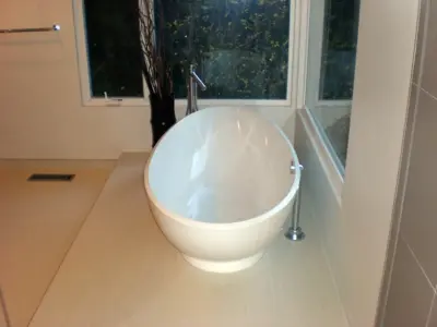 Contemporary Bathroom Aesthetics by Modern Builders Co LLC