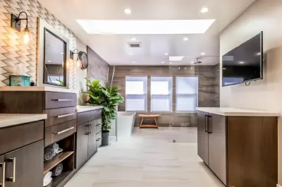 Monochrome Modern Bathroom Renovation by Modern Builders Co LLC