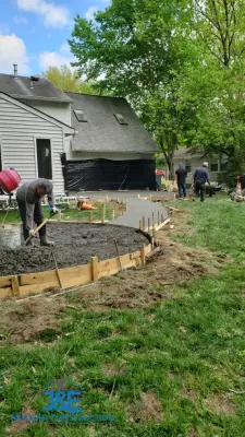 Outdoor Concrete Slab by J&E Modern Construction LLC