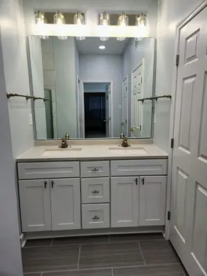 Office Expansion with Complete Bathroom and Laundry Renovation — Home Renovation & Remodeling Services project by Building Impact LLC