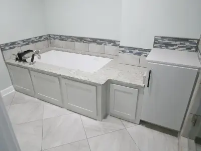 Baronne Luxury Bathroom by Before And After Builders, Inc.