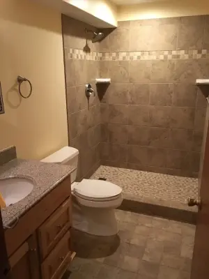 Lower level restroom — Home Renovation & Remodeling Services project by Bailey Home Services LLC