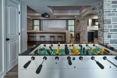 Golf Simulator Basement Renovation by Aptitude Design & Build