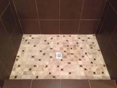 Shower tile for the basement by Home Preservation Specialists Inc