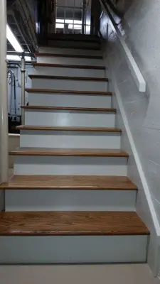 Lower level staircase — Home Renovation & Remodeling Services project by Aikins Custom Woodwork