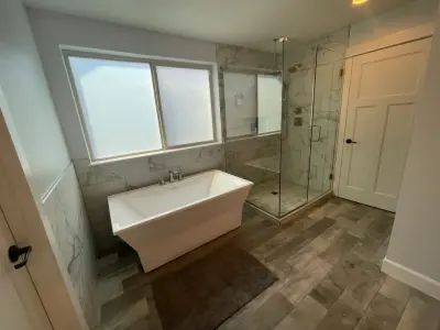 Freestanding Tub and Custom Shower Enclosure Bathroom Renovation by Ovation Restoration
