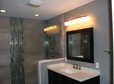 Primary Bathroom by Fredenhagen Remodel & Design