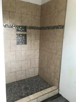 Restroom Flooring and Wall Tile Installation by JV Custom Construction LLC