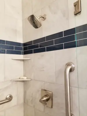 Carrara marble bathroom renovation by Prime & Precision