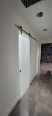 Bathroom renovation, installation of shower and barn doors — Home Renovation & Remodeling Services project by Piranha Construction