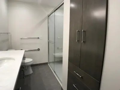 Floating Vanity Bathroom Renovation with Onyx Shower and Additional Features — Home Renovation & Remodeling Services project by D & L Construction
