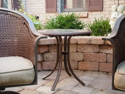 Paver patio with pergola, fire pit and grill center by Hively Landscaping Inc.
