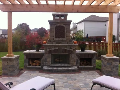 Paver patio with fireplace and pergola — Landscape Design project by Hively Landscaping Inc. in Plainfield