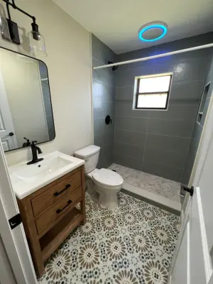 Visitor Restrooms — Home Renovation & Remodeling Services project by Intracoastal Construction & Roofing