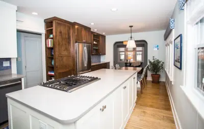 Bay View Offset Kitchen with Galley Design by LaBonte Construction