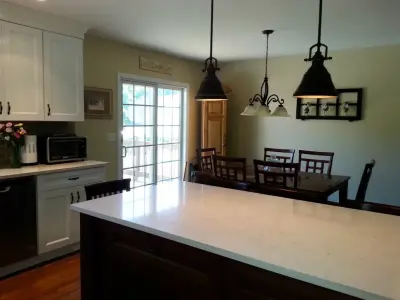 Elegant Two-Level Kitchen — Home Renovation & Remodeling Services project by Heinold Home Improvement LLC