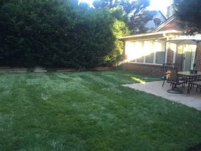 Before and after pictures of patio removal — Landscape Design project by AJ's Landscaping LLC