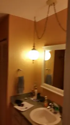 Hall Bath Transformation by Robinson Renovation & Custom Homes, Inc.