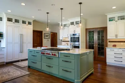 Spacious and Stunning White Kitchen Overlooking Lake Sammamish by McAdams Remodeling & Design