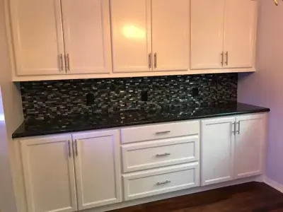 Monochrome Renovated Kitchen by Rick O's Construction And Remodeling