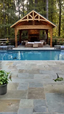 Pool in the wood by Iris Design Associates