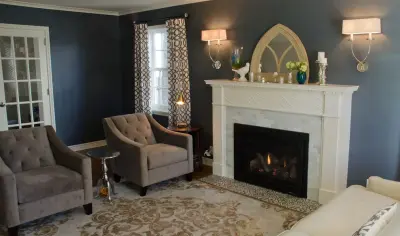 Carrera Marble Revitalizes Living Room Fireplace by Jacobson Construction