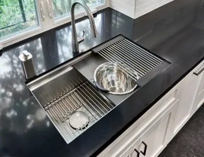 Carrollton Kitchen, Guest Bathroom, and Laundry Room Renovation by Kitchen, Bath & Home - Texas