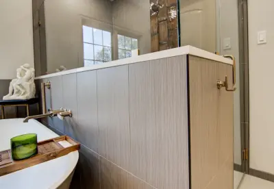 Sophisticated Bathroom Renovation with Opulent Elements by KCBR Design | Remodel