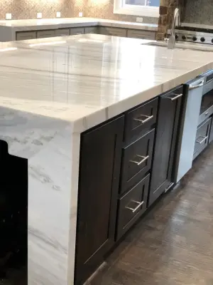 Culinary Paradise with Waterfall Island — Kitchen Remodeling project by Stone Studio A Division Of Contemporary Concepts I