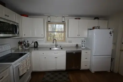 Cherry to White Cabinet Transformation - Project 3142 by Design 1 Kitchen & Bath